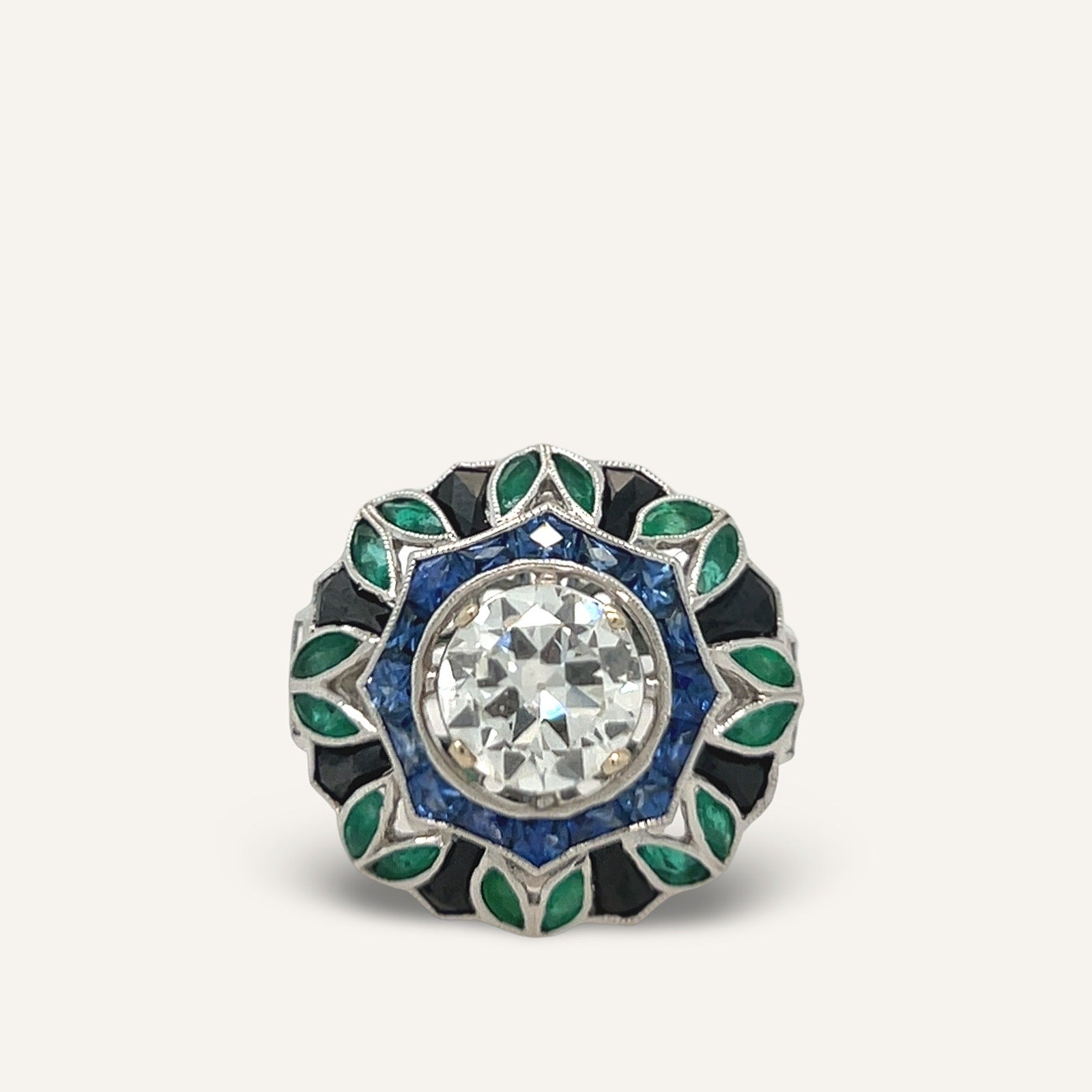 Emerald, Onyx, Sapphire and Diamond engagement ring