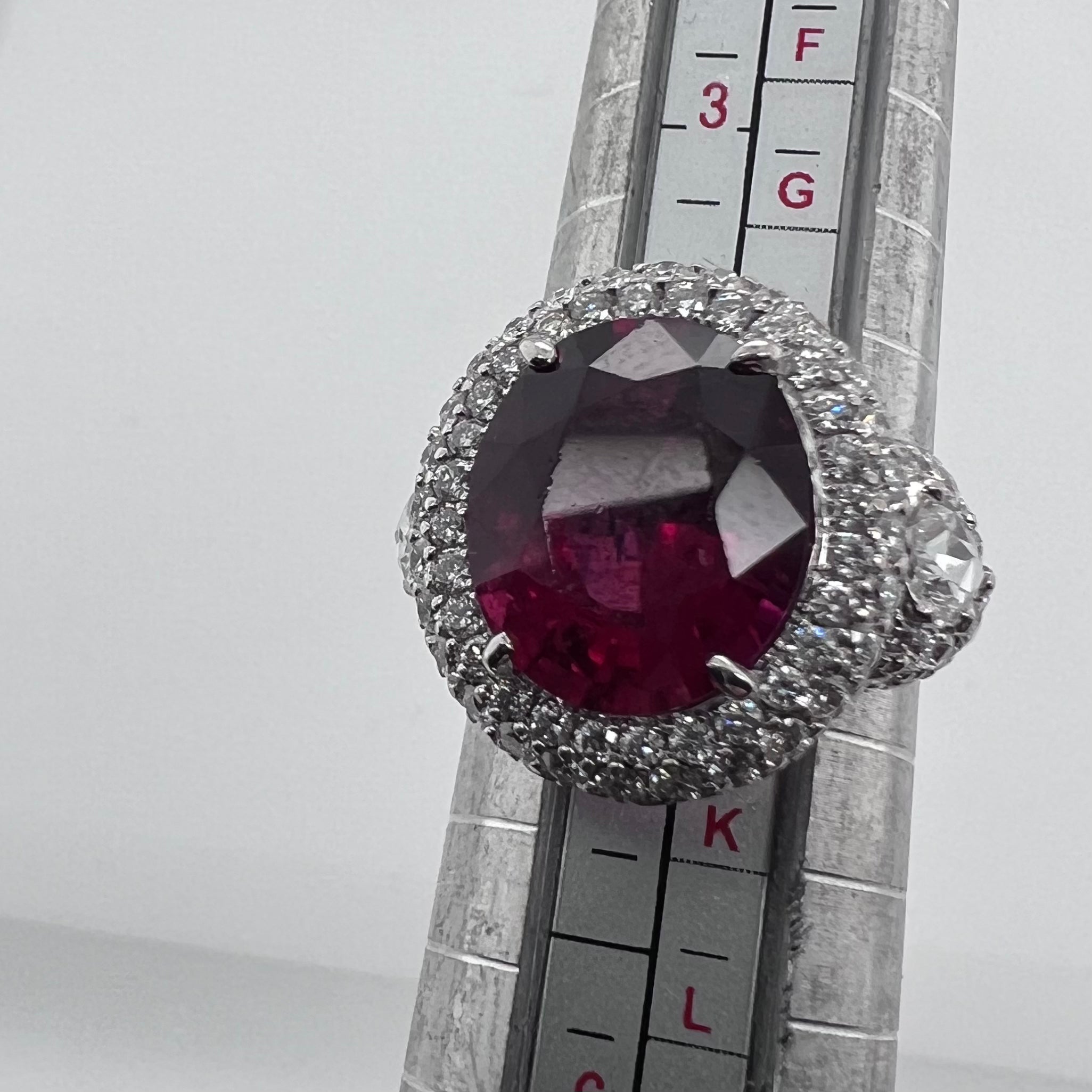 Rubellite and Diamond Halo Ring